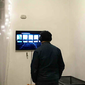 Audience member experiencing the work Absence Presence by Renzo Spiteri